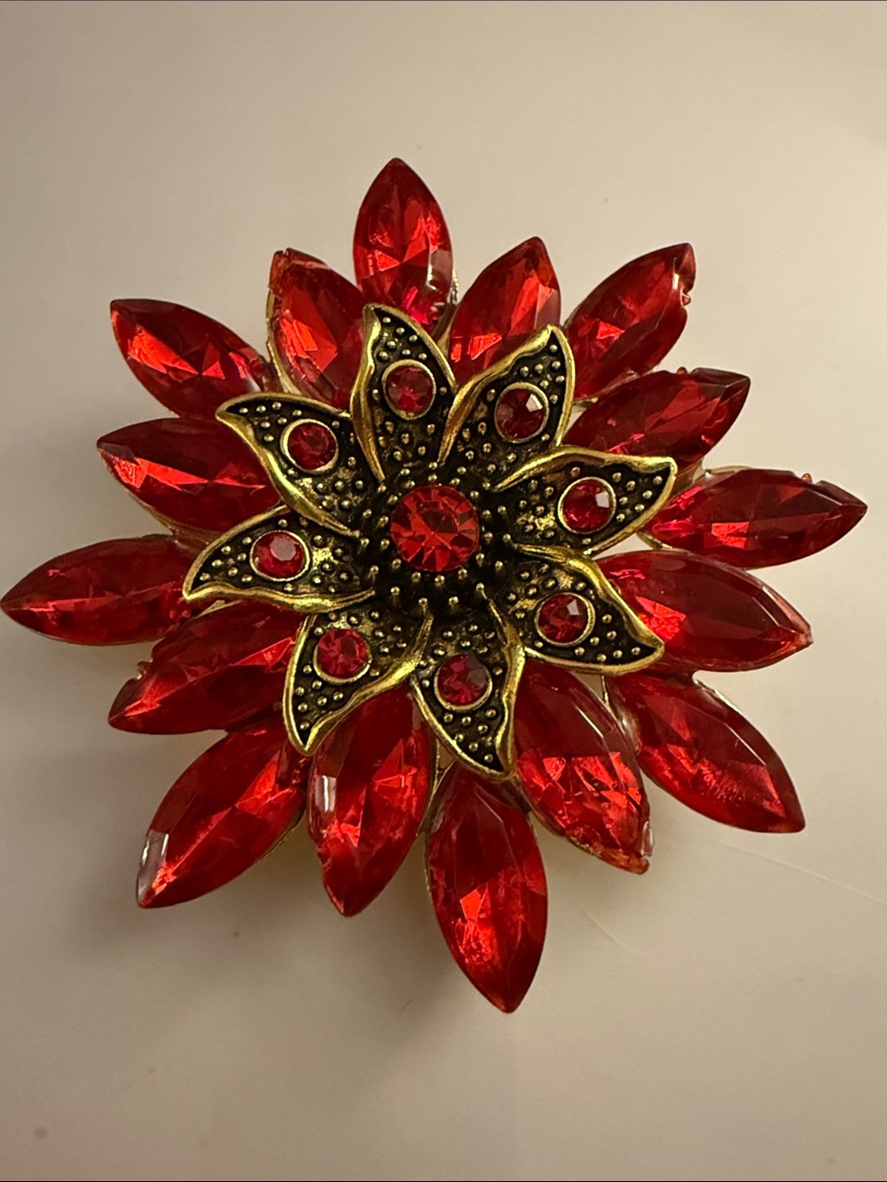Red Crystal Floral Brooch with Gold-Tone Accents